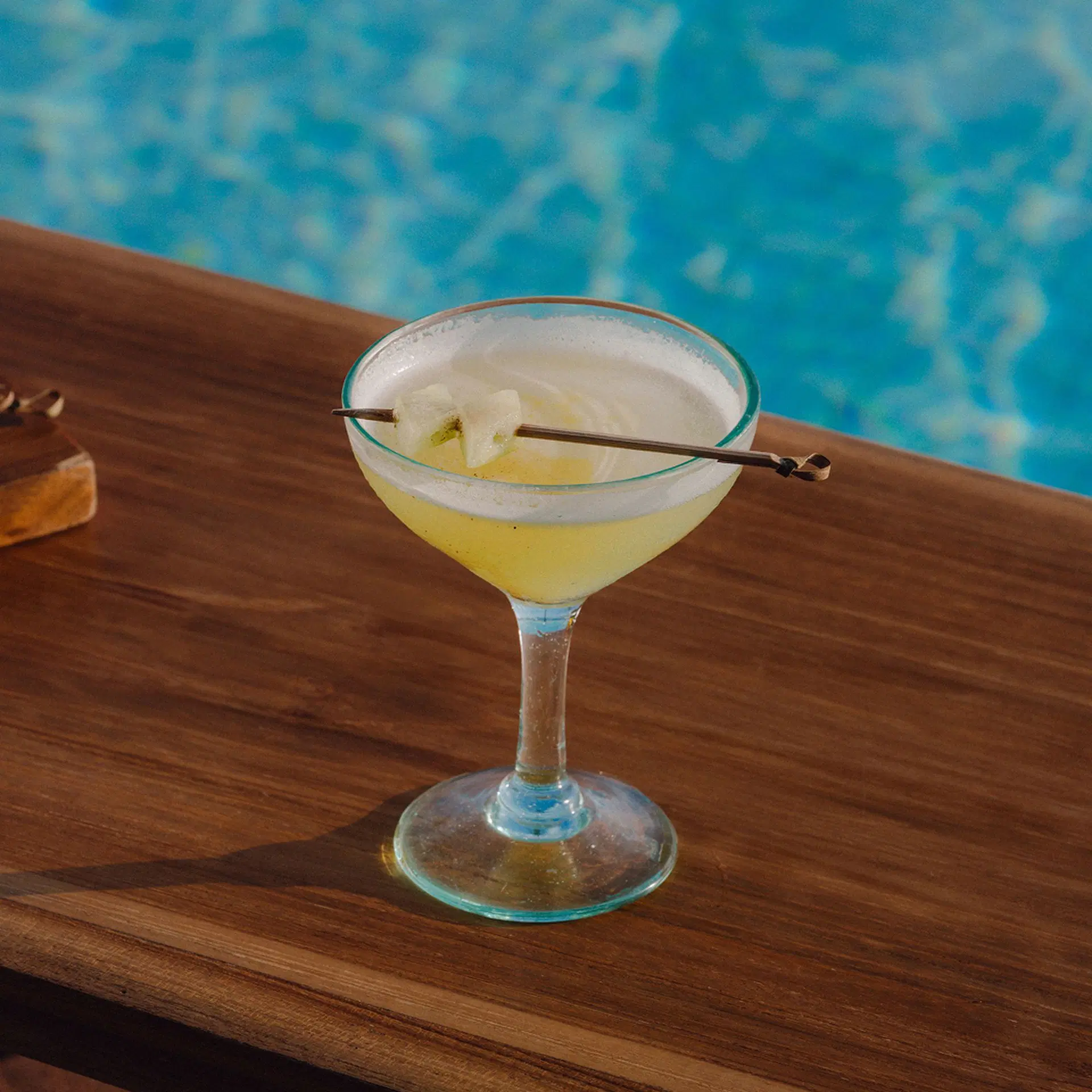 Signature cocktail served poolside at Potato Head Beach Club, Bali
