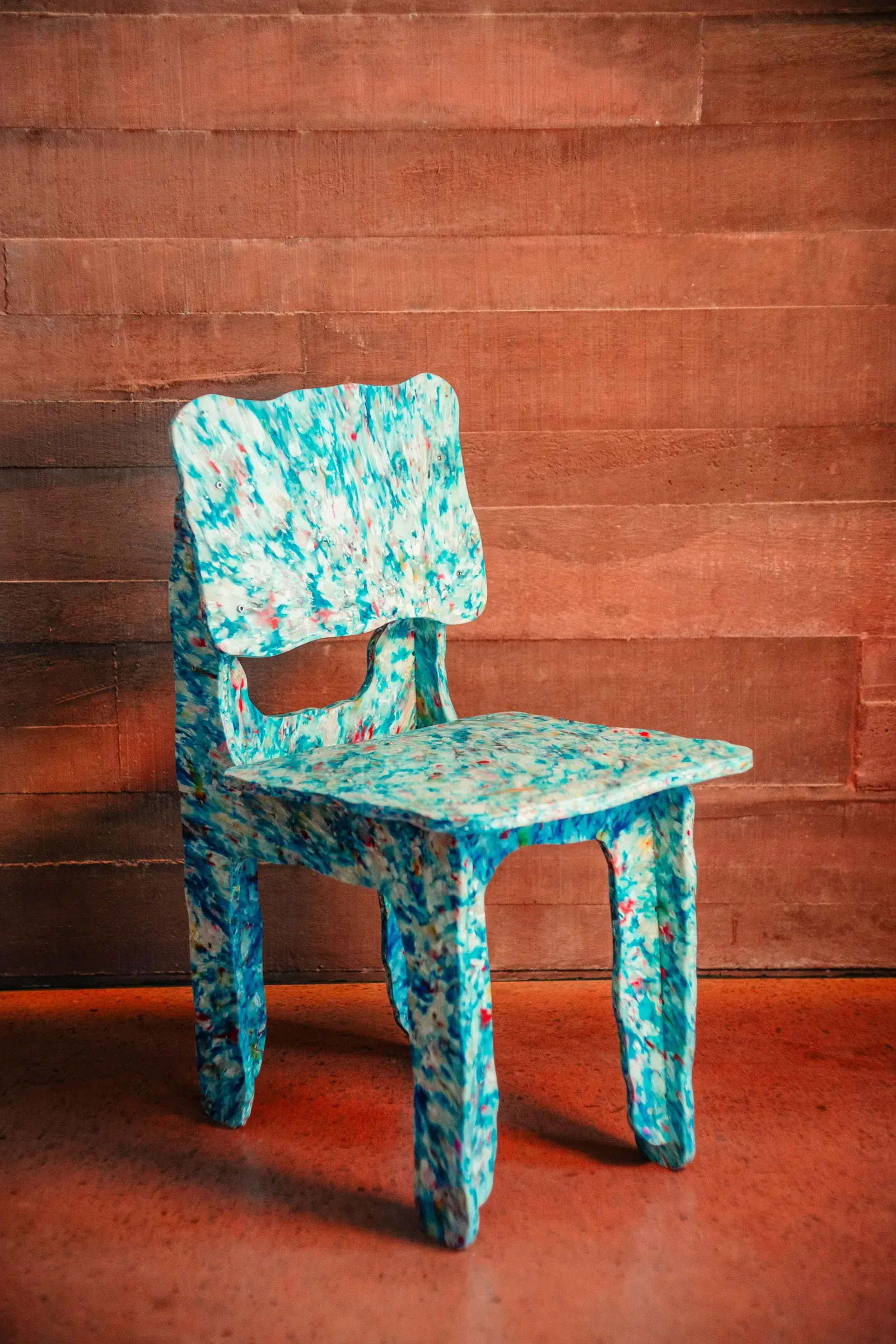 Wallpaper: "Plastic chair, made with flat sheets of 100 per cent recycled HDPE"
