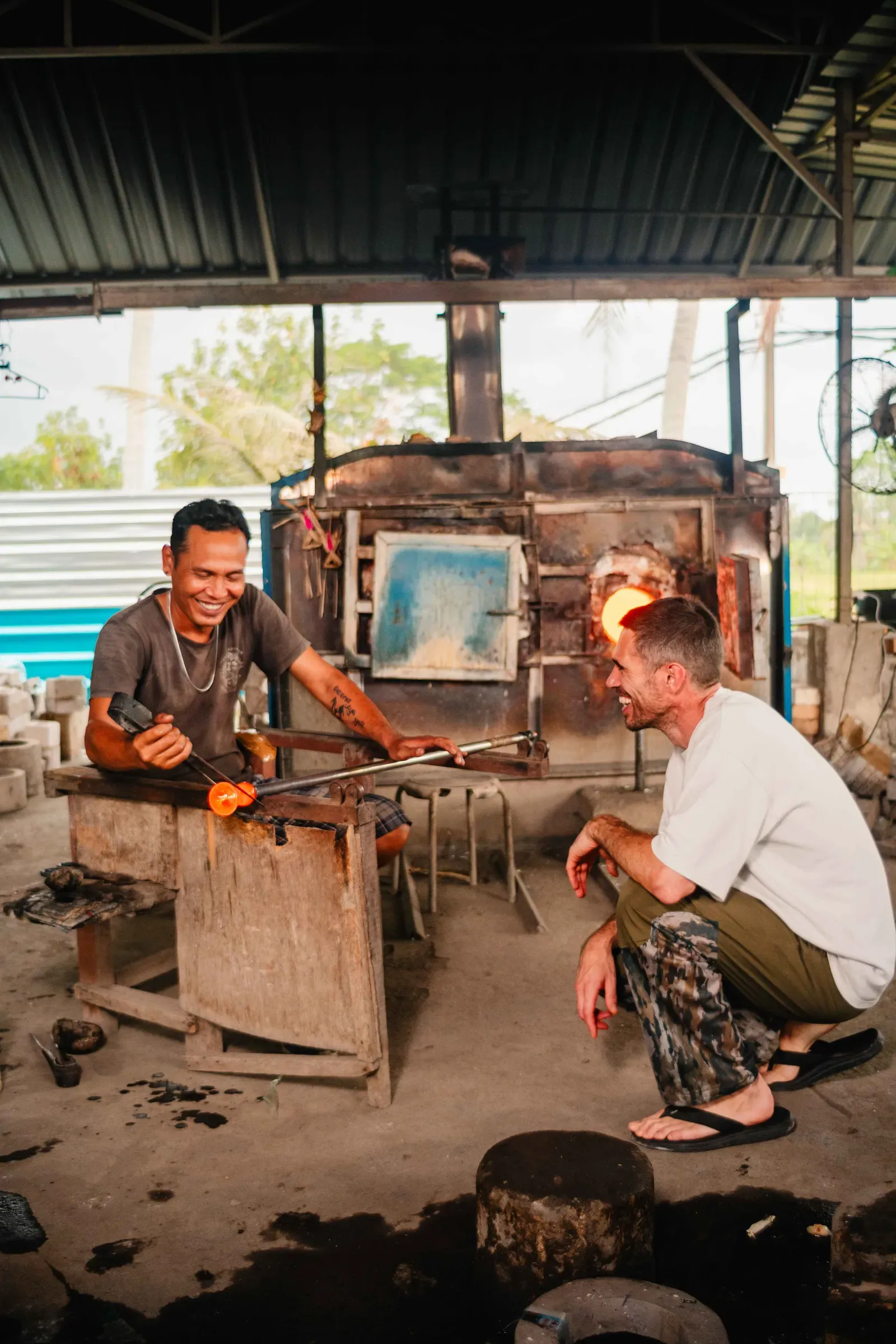 Wallpaper: "Lamb at the glassmaker's workshop in Bali, where the Broken Glass family is produced using recycled glass from Potato Head"