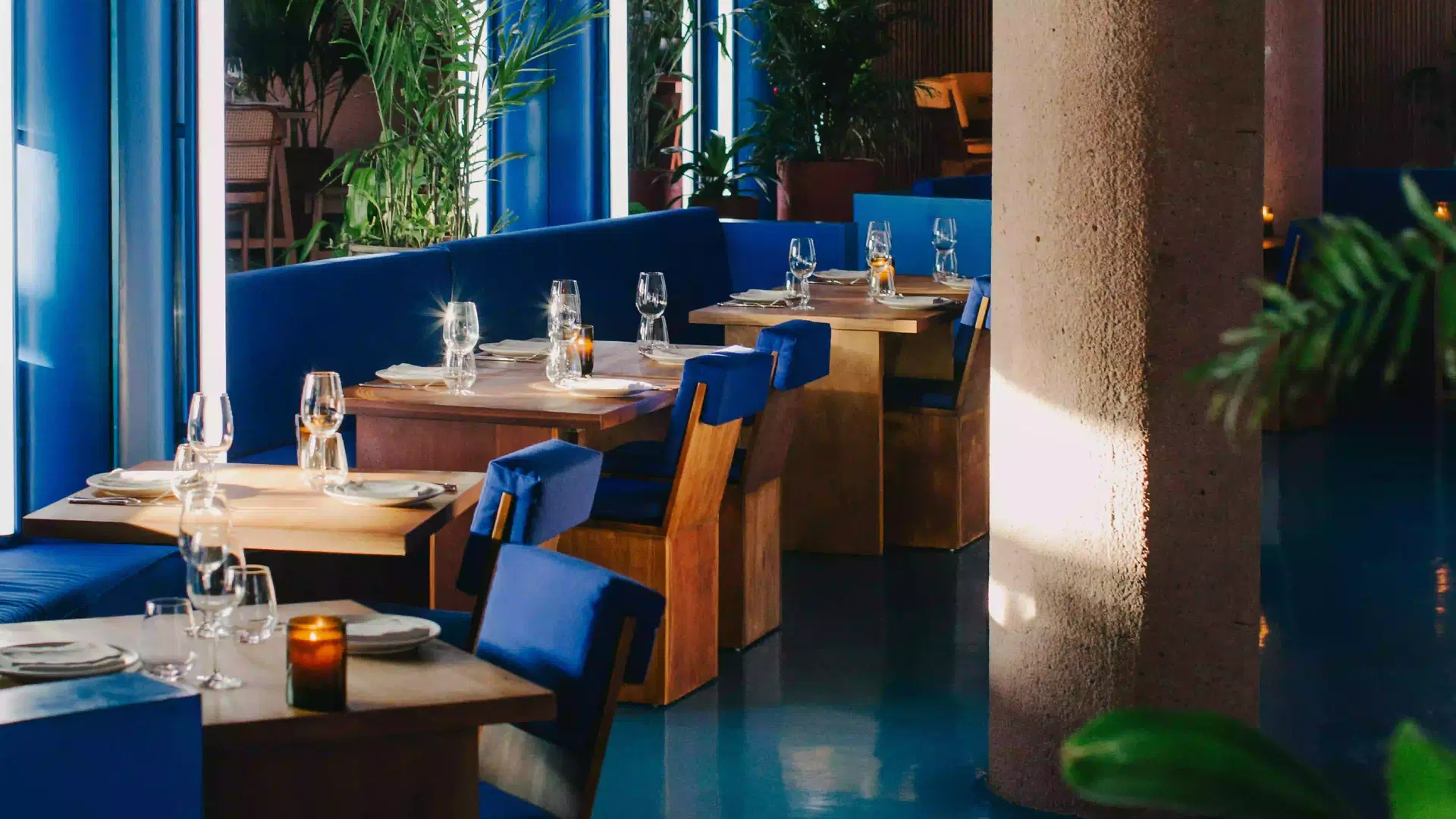 Evening dining setup inside Dome restaurant, a stylish Seminyak dinner spot at Desa Potato Head Bali