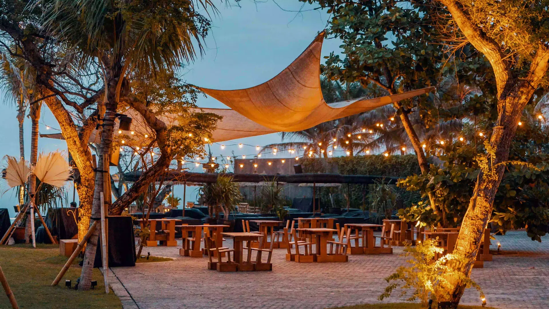 Beachfront restaurant Bali festive feast, a beautifully plated dish featuring local flavours served at Desa Potato Head Bali’s beachfront dining in Seminyak.