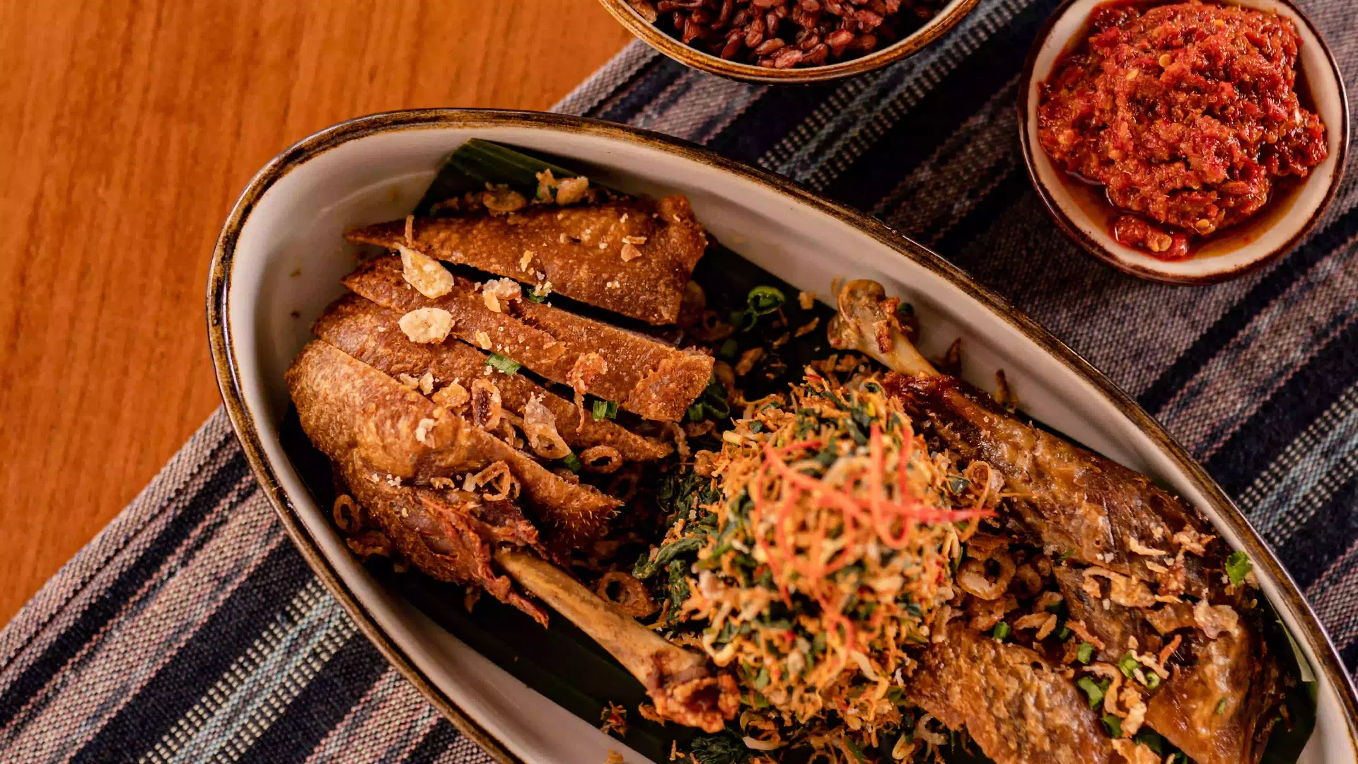 Festive sharing dish from Kaum, an Indonesian restaurant in Seminyak serving rich local flavours and heritage recipes