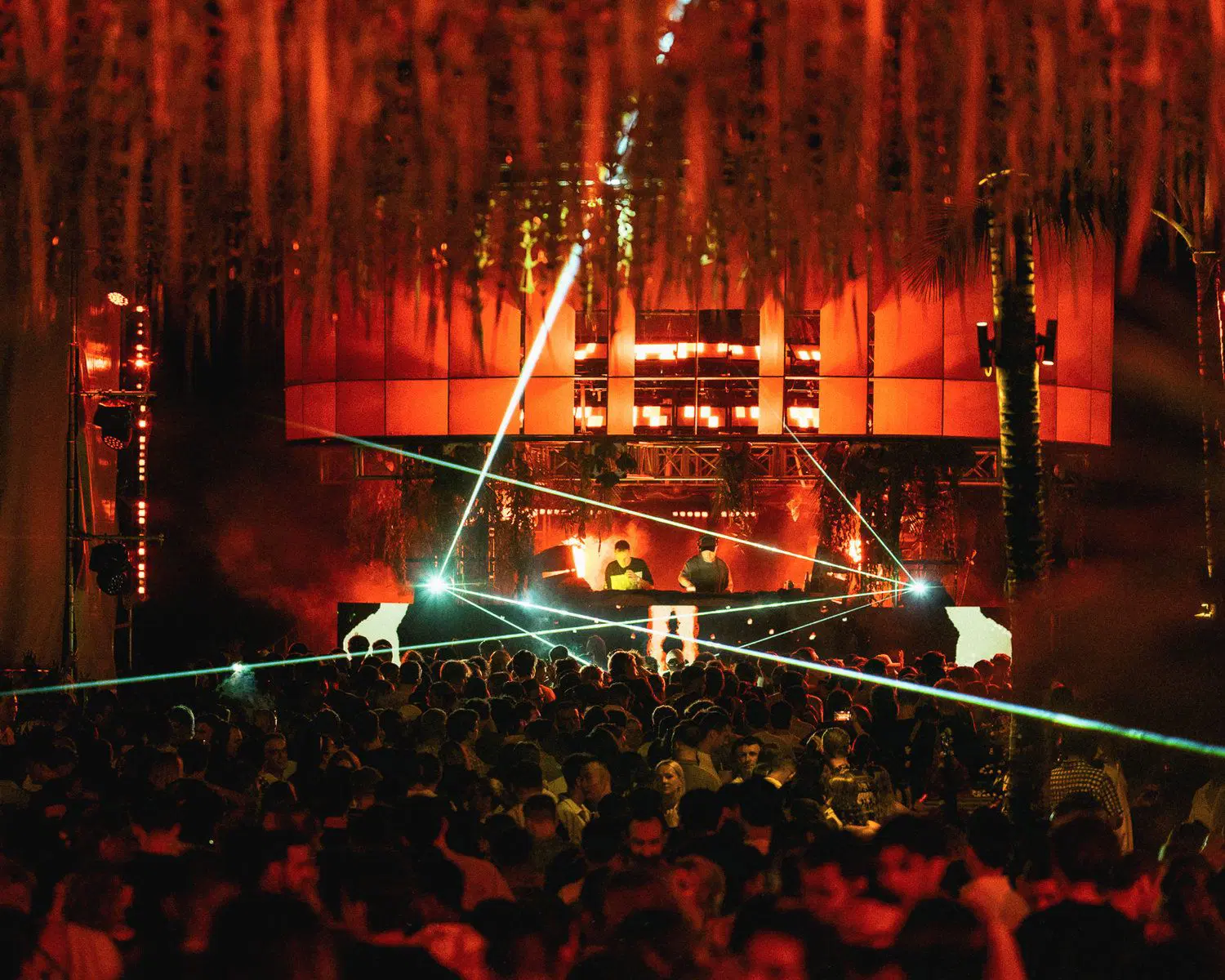 International DJ performing a live set at Potato Head NYE 2024 in Bali.