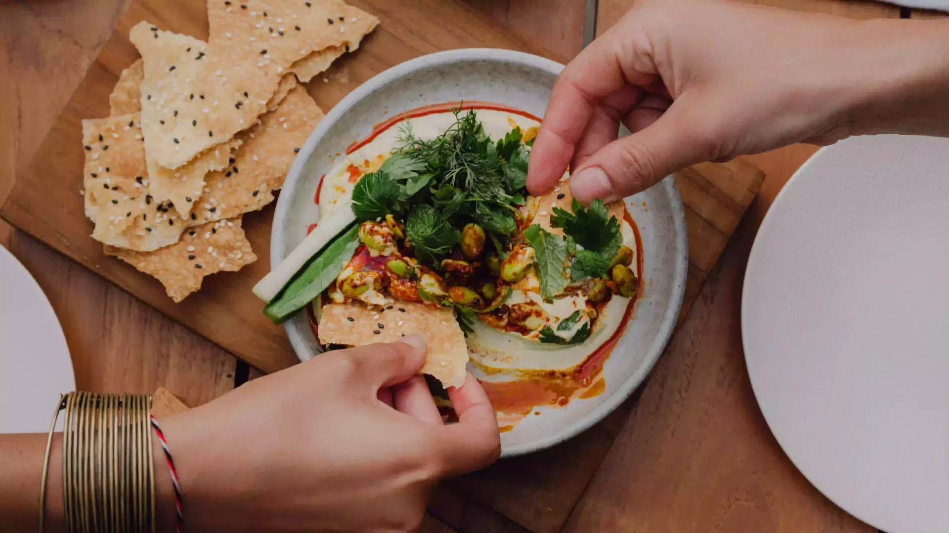 Festive Beach Club platter with local ingredient, communal dining experience by the sea at Desa Potato Head Bali