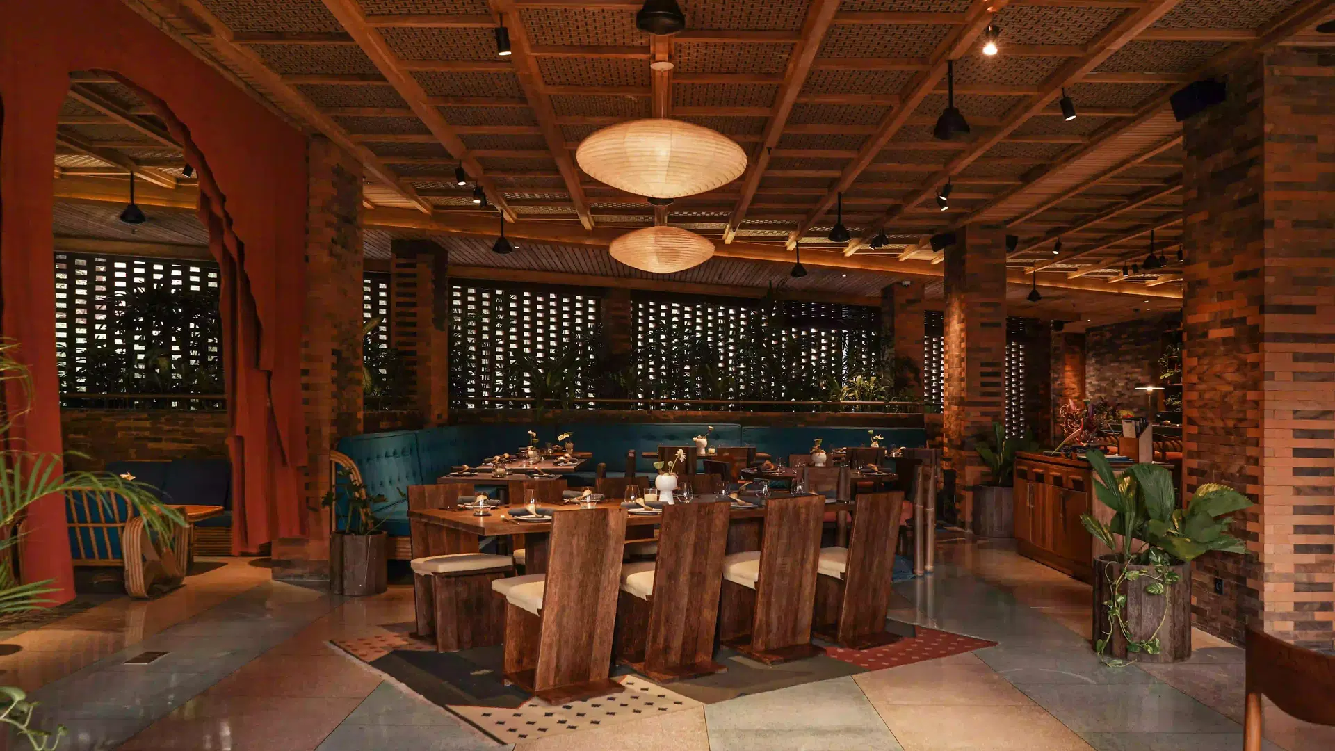 Tanaman restaurant interior at Desa Potato Head Bali — sustainable design and intimate dining space for the festive feast in Seminyak